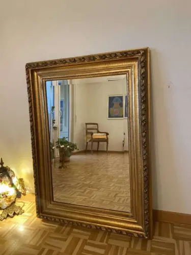 Miroir biseauté avec moulure doré à Hauterive
