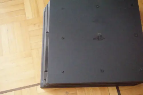 Playstation 4 avec deux manettes et 3 jeux comme neuf à Lausanne