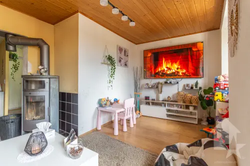 Maison villageoise avec duplex 3.5 pièces de 90 m2 et local commercial