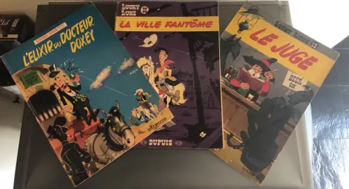 3 albums, collection originale "Lucky Luke" à Genève