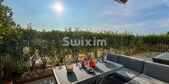 Bel appartement 3.5 pièces en rez-de-chaussée avec terrasse privative