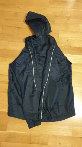 Veste de pluie Blue marine très bonne état à Renens