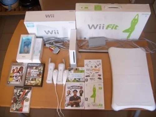 Console Wii+wii balance board+4jeux+gara à Martigny