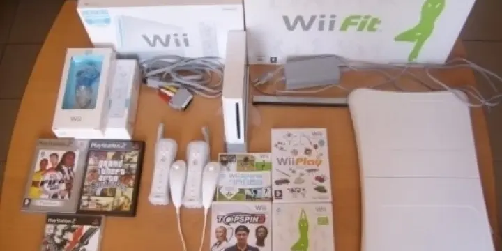 Console Wii+wii balance board+4jeux+gara