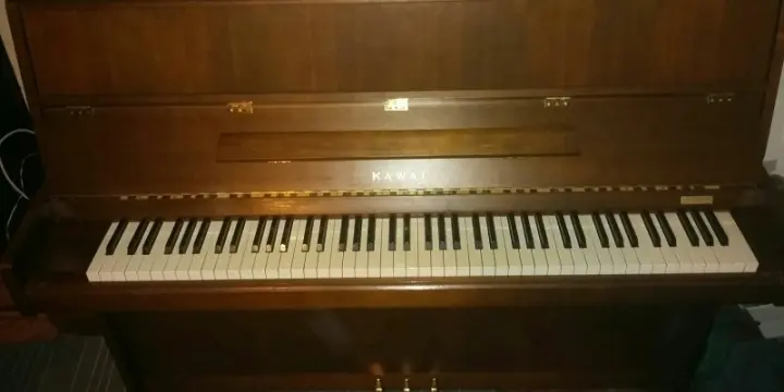 Piano kawai droit en excellent état