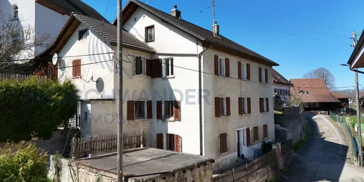 Immeuble locatif de 4 appartements loués avec jardins privatifs