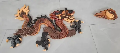 A vendre : Dragon en bois avec boule de feu... à Vuisternens-en-Ogoz
