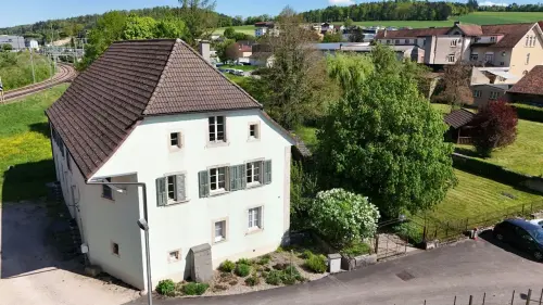 Maison locative de 2 logements à vendre dans la ville de Porrentruy à Porrentruy