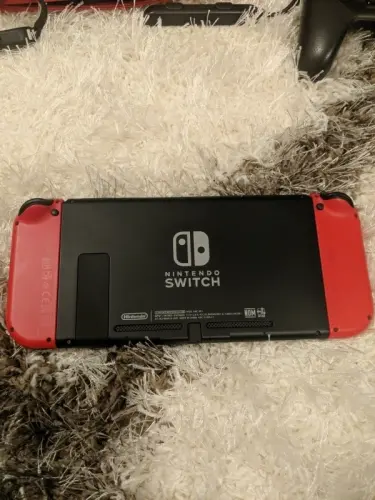 Nintendo Switch rouge +  jeux + acessoires à lugano
