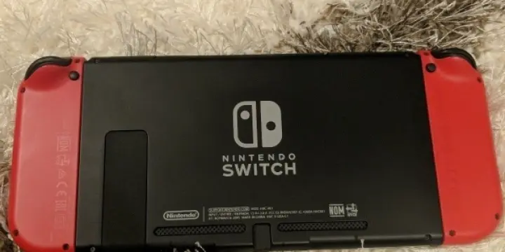 Nintendo Switch rouge +  jeux + acessoires