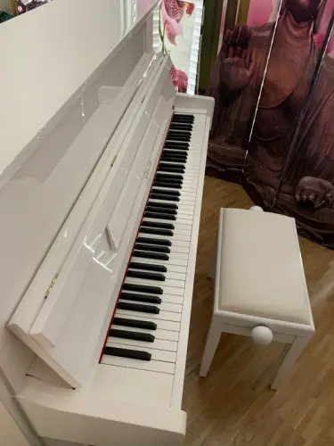 Piano droit d'occasion RITTMÜLLER à Genève