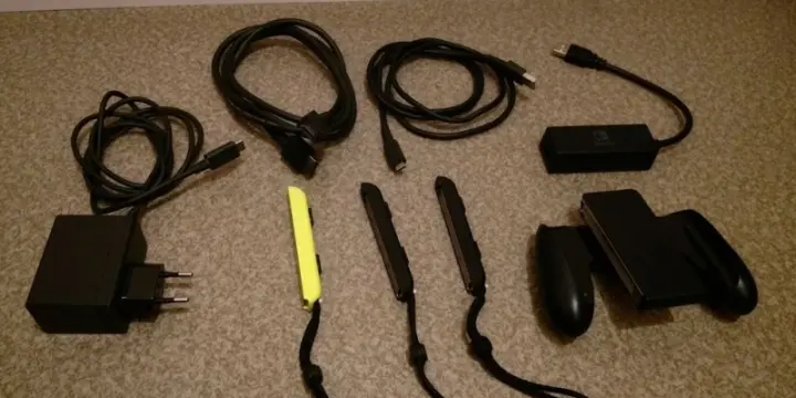 Nintendo avec 3 jeux et accessoires.