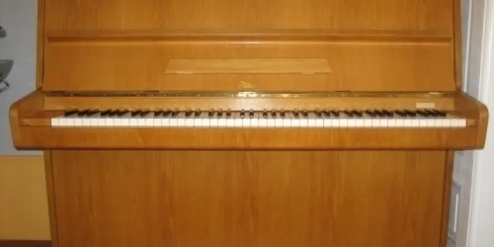 Urgent - Genève : piano droit d'occasion