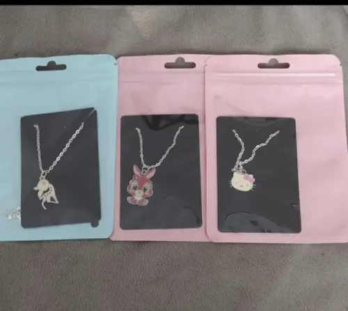 Lot de 3 colliers enfants neufs à Moutier