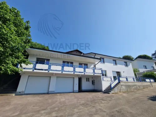 Habiter sans frais grâce à votre investissement - 2 logements + garage à Delémont