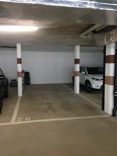 place de parc dans garage intérieur Martines 32, Le Mont à Le Mont
