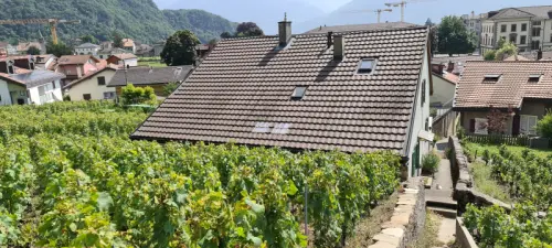 Maison de quatre appartements idealement située à Aigle