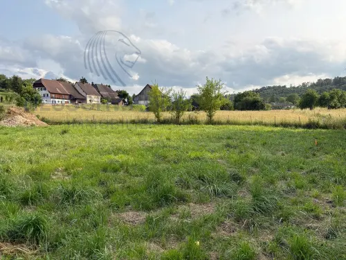 Terrain superbement situé avec permis de construire à Coeuve