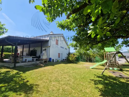 Maison locative avec local commercial de 8.5 pièces sur 330 m² à Courrendlin