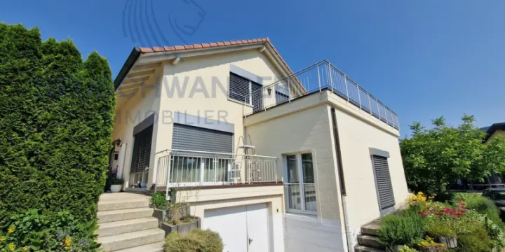 Maison familiale de 6.5 pièces sur une parcelle de 570 m²