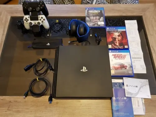 PS4 par 1TB + accessoires + garantie à wallis