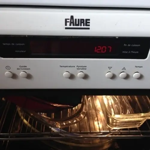 cuisinière blanche 3 feux induction à ‎Cartigny