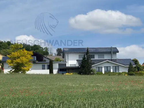 Villa luxueuse sur une parcelle généreuse avec une vue imprenable. à Porrentruy