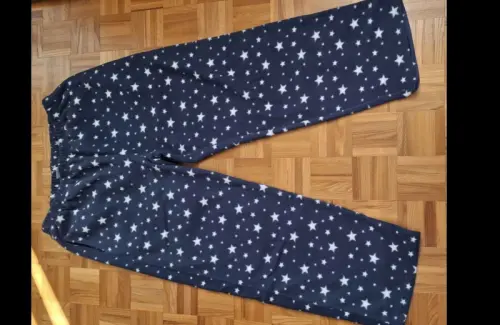 Pantalon bleu en polaire avec étoiles  Simone comme neuf à Moutier