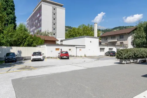 A LOUER, CENTRE-VILLE DE SION, PLACE DE PARC EXTERIEURE à Sion