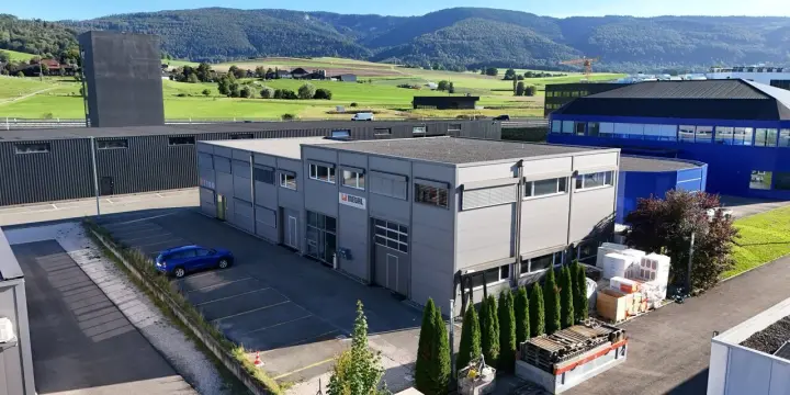 À vendre immeuble avec ateliers et bureaux à Delémont