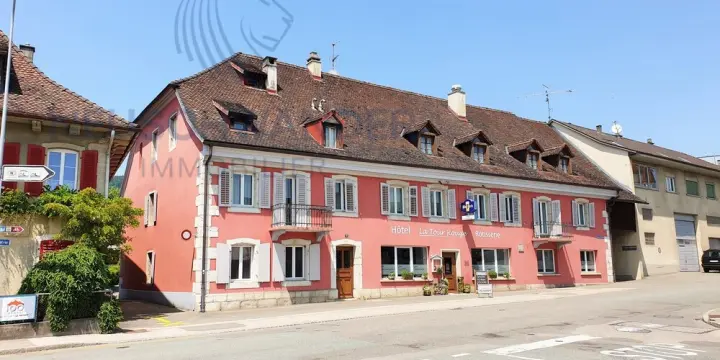 Avec 20 places de parc bâtiment de renom entièrement loué