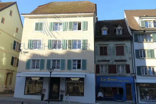 Lot de 2 immeubles dans le coeur historique de la ville à Delémont