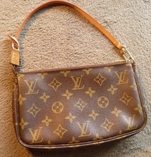 A vendre - Pochette accessoire Louis Vui à lausanne