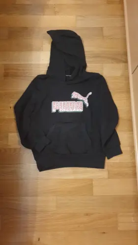 Pull noir a capuchon Puma T140 10.- à Renens