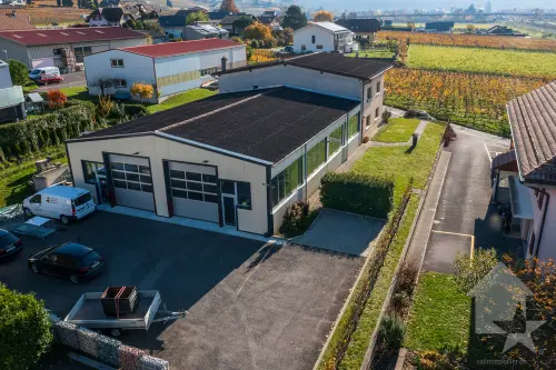 Immeuble mixte de 2 appartements et un atelier à Aigle