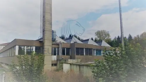 Grand terrain avec possibilité de construire un ou plusieurs immeubles à Porrentruy