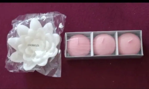 Lot de 4 bougies flottantes neuves à Moutier