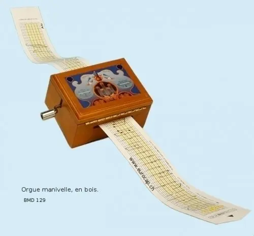 Orgue manivelle en bois à Ferlens