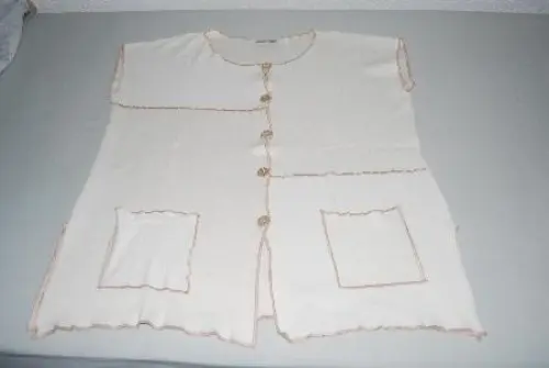 Top beige avec coutures brunes à Vucherens