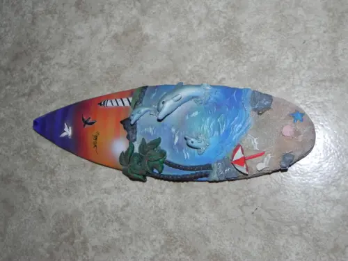 A vendre déco planche surf à suspendre 30 cm à Yverdon
